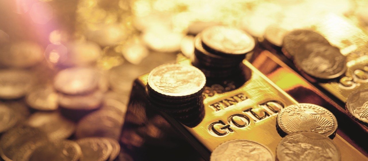Goldbarren und Goldmünzen